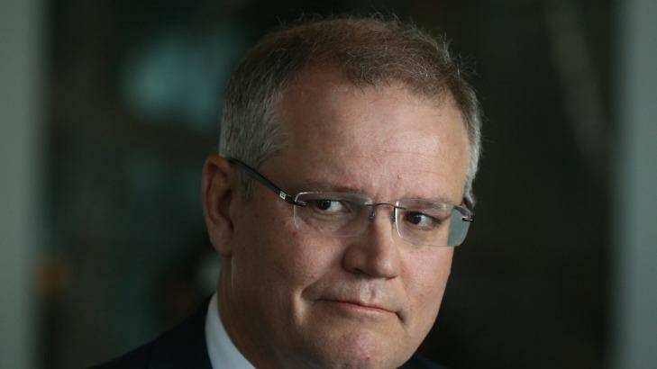 Scott Morrison says the parental leave changes will provide a "safety net for those families who do not have access to generous public sector or corporate schemes". Photo: Andrew Meares