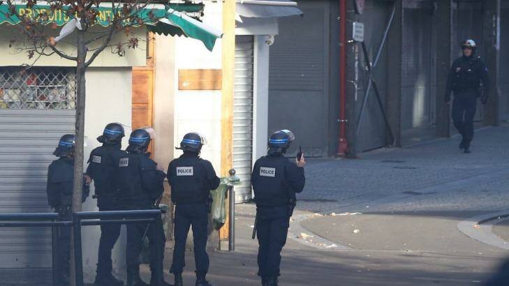 Military and police conduct an operation in Saint Denis on Wednesday. Photo: Andrew Meares