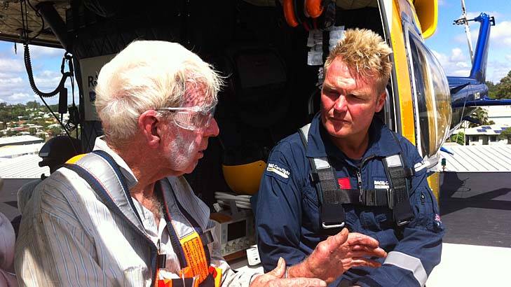 RACQ CareFlight Rescue Aircrewman, Richard Mitchell, pictured with rescued man, Colin Clift. Photo: RACQ CareFlight