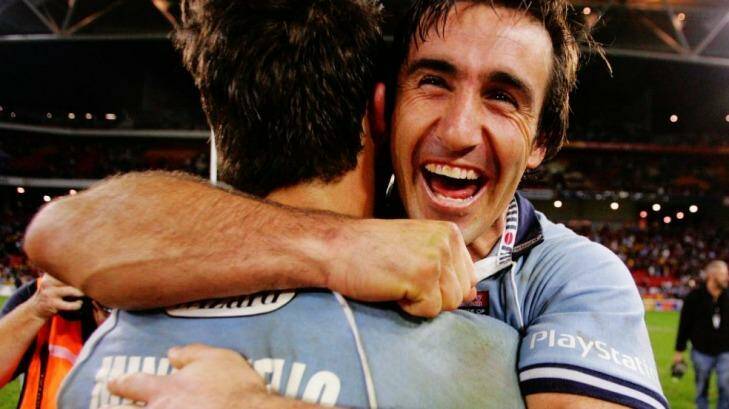 Andrew Johns embraces Anthony Minichiello after NSW won the 2005 State of Origin series. Photo: Craig Golding