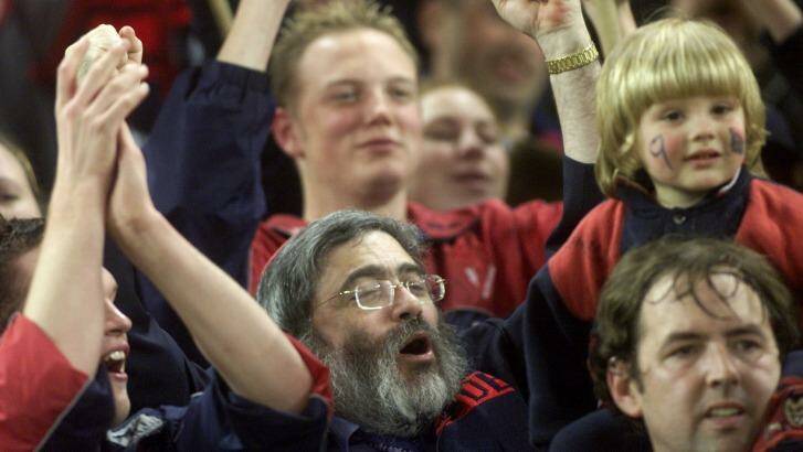 Joe Gutnick celebrates win Demons fans in 2001. Photo: Pat Scala