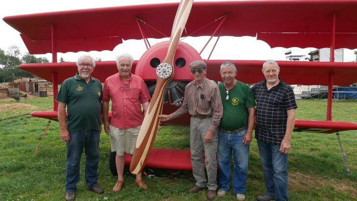 From left:  Yves Potard with Red Baron plane replica artisans Alain Engelaere, Jacky Faude, Jean-Claude Briere and Pierre Thomas. Photo: Nick Miller