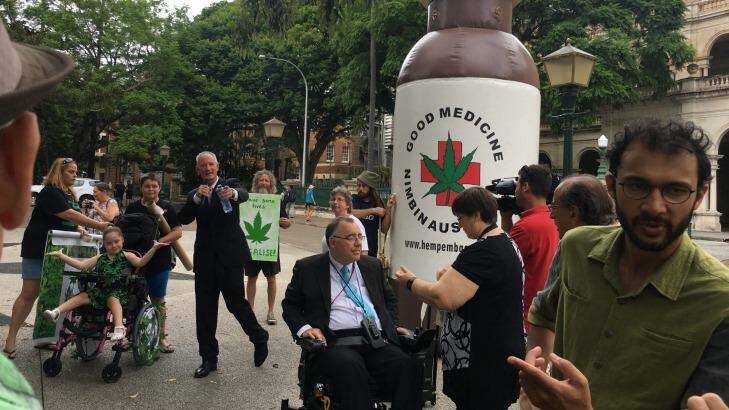 One Nation MP Steve Dickson,?Independent MP?Rob Pyne and councillor?Jonathan Sri lead a?rally supporting medicinal cannabis outside Queensland Parliament. Photo: Felicity Caldwell