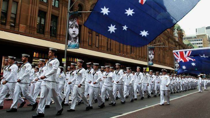 Members of the Royal Australian Navy march along George Street on Saturday. Photo: Lisa Maree Williams