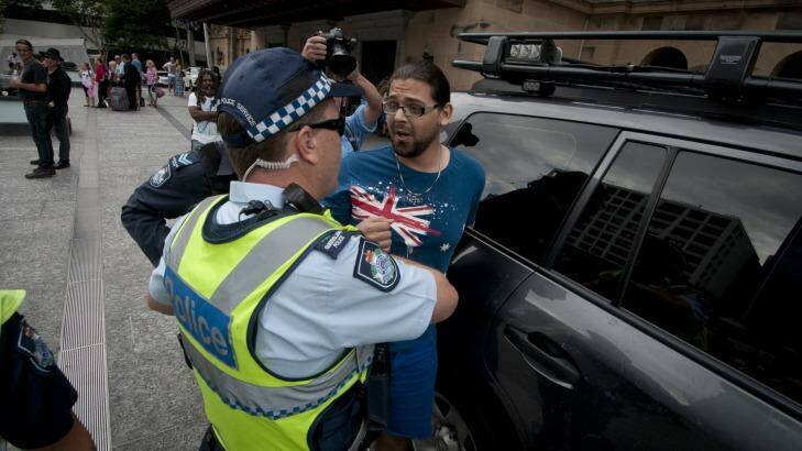 Police issued two protesters with move on directions and charged one for public nuisance. Photo: Robert Shakespeare