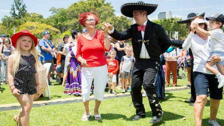 Dancers get involved with the crowd at the Brisbane Mexican Festival. Photo: Tammy Law