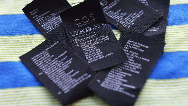 Seven pages of clothing care information from one dress. Photo: Joe Armao