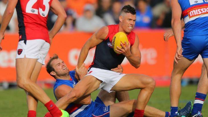 Former banned Bombers Stewart Crameri and Jake Melksham in the thick of the action. Photo: AFL Media/Getty Images
