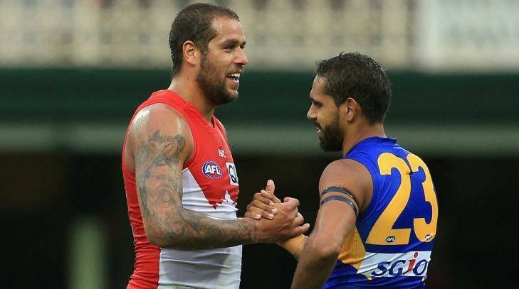Frenemies: Lance Franklin and former teammate Lewis Jetta embrace following the round five match between the Sydney Swans and the West Coast Eagles at the Sydney Cricket Ground. Photo: Cameron Spencer