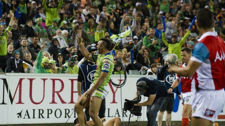 Jordan Rapana holds up four fingers to the crowd celebrating his fourth try against the Tigers.  Photo: Rohan Thomson