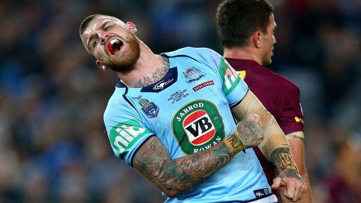 So close, yet so far: Josh Dugan grimaces after missing his late field goal attempt. Photo: Cameron Spencer