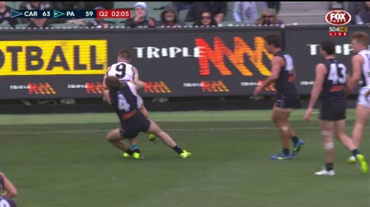 Carlton's Bryce Gibbs was banned for this tackle on Port Adelaide's Robbie Gray. Photo: Fox Footy