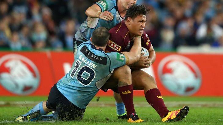 Queensland's Josh Papalii felt the full force of the Blues Photo: Cameron Spencer