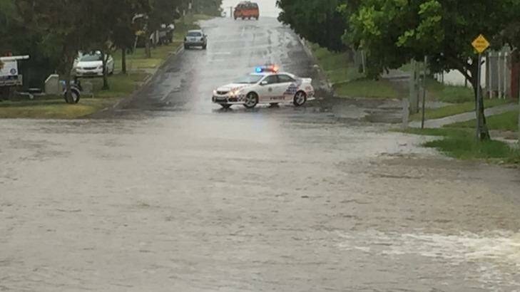 Flash flooding hits Albert Street, in Goodna.  Photo: Paul Tully