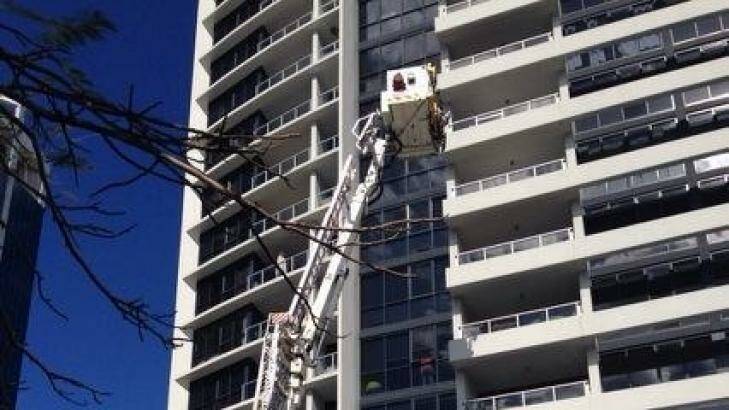 A cherry picker used by police to examine Gable Tostee's apartment.