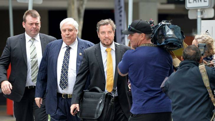 Clive Palmer arrives on Thursday at the Federal Court to answer questions regarding the fall of Queensland Nickel. Photo: Bradley Kanaris