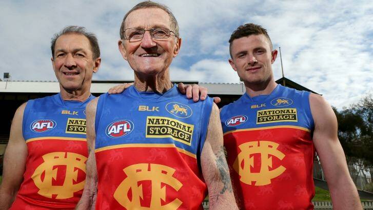 Former Fitzroy champions (L-R) Gary Wilson and Kevin Murray with Brisbane Lions player Pearce Hanley at the Junction Oval on Friday.  Photo: Pat Scala