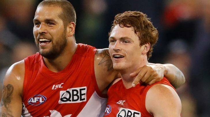 Big night: Lance Franklin celebrates a goal with Gary Rohan in the Swans' win over Geelong on Friday night. Photo: Adam Trafford/AFL Media