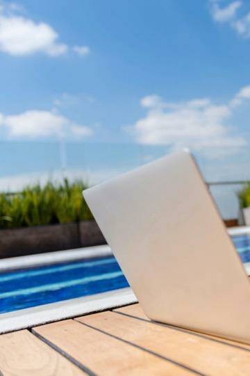 Being a travel writer isn't all relaxing by the pool with a cocktail: Just some of it is. Photo: iStock