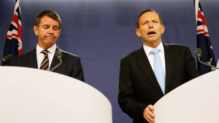 Prime Minister Tony Abbott, right, and NSW Premier Mike Baird. Photo: Daniel Munoz