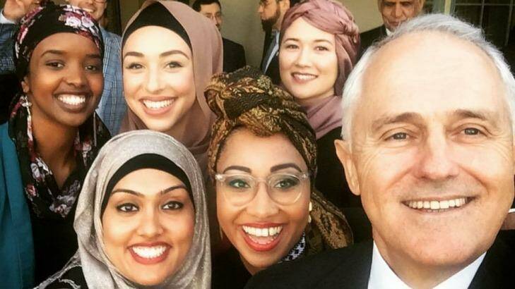Yassmin Abdel-Magied poses for a selfie with Prime Minister Malcolm Turnbull at an Iftar dinner during the election campaign. Photo: Supplied
