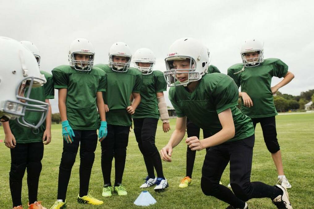 Next generation:  The NSW Gridiron under 8 team at training this week. Photo: Christopher Pearce
