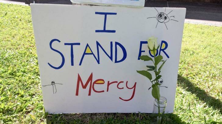A sign calling for mercy at the Brisbane candlelight vigil. Photo: Phillip Wells
