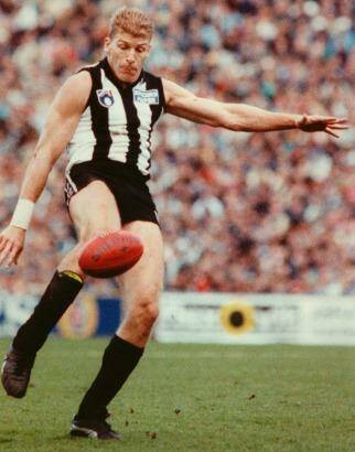 Michael Christian playing for the Pies in 1990. Photo: Wayne Ludbey