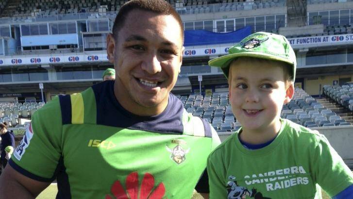 Jack Woodhams, 6, meets one of his Raiders heroes, Josh Papalii last year. Jack, who passed away in January, is a source of inspiration for the Kangaroos back-rower. Photo: Paul Woodhams