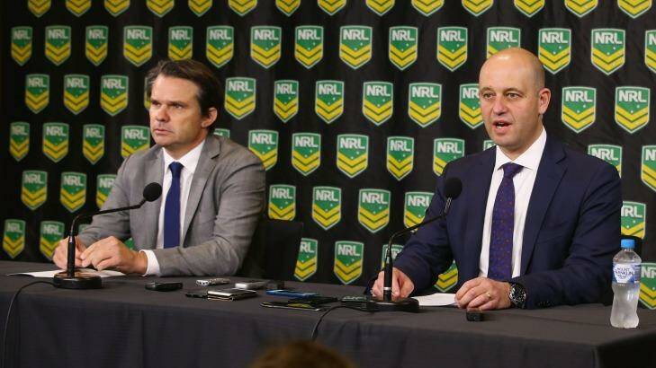 NRL integrity boss Nick Weeks watches as NRL CEO Todd Greenberg delivers the bad news for Parramatta: 12 competition points and a $1 million fine for salary cap breaches. Photo: Mark Kolbe