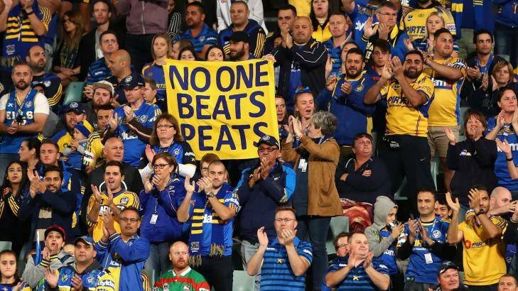 Tribute: Eels fans stood for a minute's applause to show their respect for Nathan Peats, who was forced out to get the club under the salary cap.  Photo: Cameron Spencer