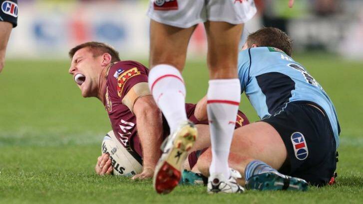 Brent Tate screams in agony after injuring his leg in Origin last month. Photo: Anthony Johnson