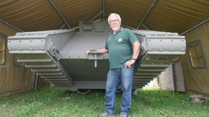 Yves Potard with a replica World War I tank. Barry Gracey and his wife Yvonne have raised $150,000 to buy a site for a proper memorial. Photo: Nick Miller