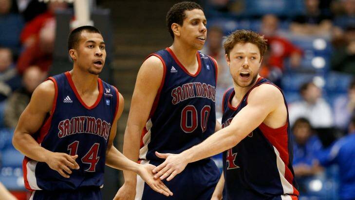 College days: Stephen Holt with St Mary's Gaels teammates Brad Waldow and Matthew Dellavedova during a game against the Middle Tennessee Blue Raiders during the first round of the 2013 NCAA tournament. Photo: Gregory Shamus