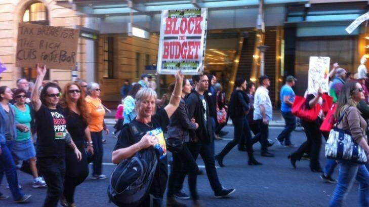 People take to the streets of Brisbane to protest over the Federal Budget. Photo: Tony Moore
