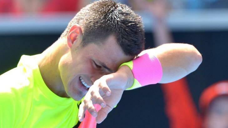 A deafening silence: Tomic endures a tough day at the office. Photo: Joe Armao