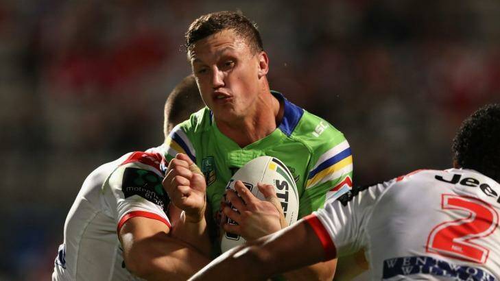 Jack Wighton of the Raiders is tackled  Photo: Cameron Spencer