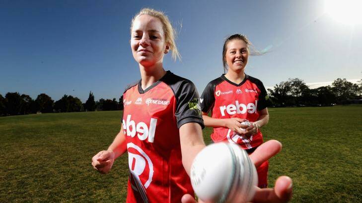 Melbourne Renegades players Dani Wyatt (left) and Molly Strano. Due to a quirky commercial deal signed off by Cricket Australia, sports editors and producers are being forced to leap several hurdles to access photos from WBBL matches. Photo: Wayne Taylor