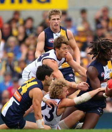 Nic Naitanui, Chris Mayne, Lee Spurr and Chris Masten will be in the thick of it on Sunday. Photo: Paul Kane