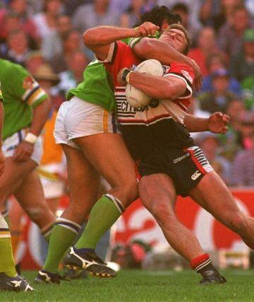 Lohn Lomax's tackle on Billy Moore in the 1994 preliminary final. Photo: Craig Golding