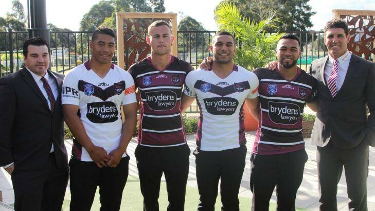 Two proud clubs unite...Blacktown Workers Sea Eagles Coach Pat Weisner, forward Tom Amone, half-back Matt Place, hooker Josh Tangitau, specialist utility Jerry Key, and Manly Warringah Coach Trent Barrett at the jersey launch at Blacktown Workers.