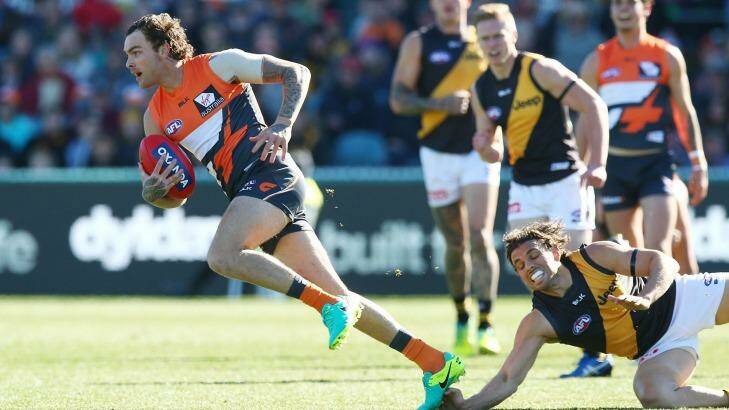 Giant Rory Lobb leaves Tigers in his wake before injuring his ankle.  Photo: Mark Nolan