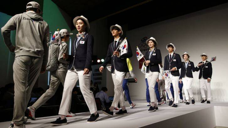 Protection: South Korean athletes model their 2016 Olympic uniform in Seoul. Photo: Lee Jin-man