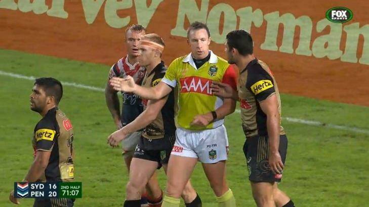 Touchy situation: Sam McKendry makes contact with referee Jared Maxwell during Monday night's game against the Sydney Roosters. Photo: Fox Sports