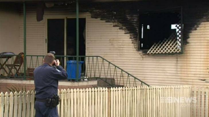Firefighters investigate a blaze in Gympie that left 12-year-old Alexis Dean in a critical condition.  Photo: Nine News