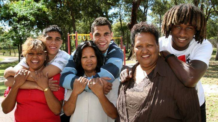 Mothers and sons: a young Nic with Atetha  (right) grew up in the same street as  Michael Walters and his mother Martha Penny (left) and Chris and Debbie Yarran Photo: Mal Fairclough