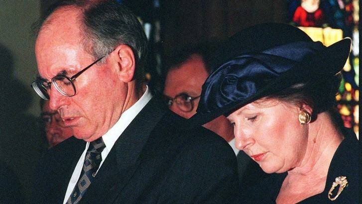 The Prime Minister and his wife Janette in 1996 at a Canberra service to pray for the victims and families of the Port Arthur tragedy. Photo: Mike Bowers