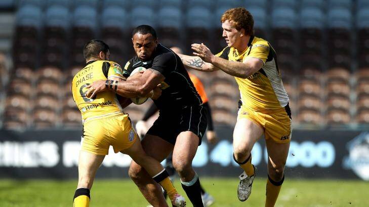 England stint: Antonio Kaufusi carts the ball up during his time with the London Broncos. Photo: Getty Images 
