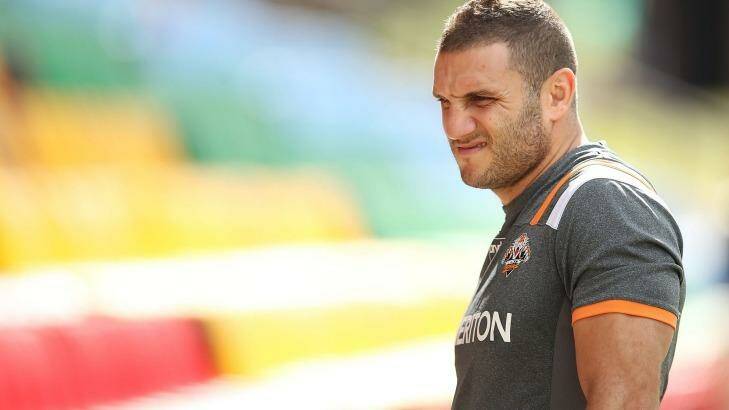At the centre of a firestorm:  Robbie Farah looks on suring Wests Tigers training. Photo: Brendon Thorne