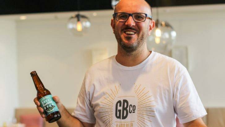 Good Beer Co. founder James Grugeon with a bottle of Great Barrier Beer. Photo: Supplied